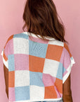 Pull à manches courtes à blocs de couleurs orange pamplemousse