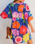Robe babydoll bleu foncé à imprimé floral et col fendu