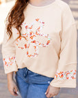 Beige Plus Size Flower Patched Side Slits Crewneck Top - Toi ‘n’ Moi Ltd