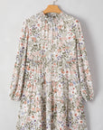 Robe courte à volants et col montant froncé à imprimé floral vert