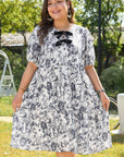 Black Floral Print Bow Detail Puff Sleeve Plus Size Midi Dress - Toi ‘n’ Moi Ltd