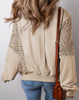 Sweat-shirt en tricot parcheminé avec bordure côtelée et coutures apparentes