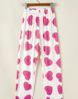Ensemble de détente avec débardeur à volants rose et pantalon à imprimé cœur
