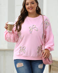 Sweat-shirt oversize rose clair à manches lanternes et nœud brodé