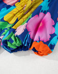 Robe babydoll bleu foncé à imprimé floral et col fendu