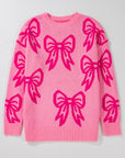 Pull ample à épaules tombantes et motif nœud rose