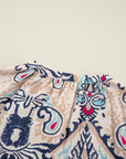 White Abstract Printed Notched V Neck Split Half Sleeve Blouse