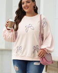 Sweat-shirt oversize à manches lanternes et nœud brodé en parchemin