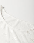Haut à manches longues avec motif nœud en maille blanche