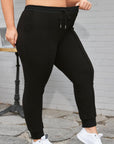 Black Plus Size Textured Exposed Seam Drawstring Jogger Pants - Toi ‘n’ Moi Ltd