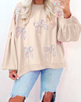 Sweat-shirt oversize à manches lanternes et nœud brodé en parchemin