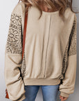 Sweat-shirt en tricot parcheminé avec bordure côtelée et coutures apparentes