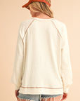 Beige Exposed Seam Crinkle Rib V Neck Pullover Top - Toi ‘n’ Moi Ltd