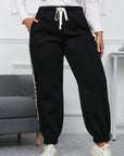 Black Plus Size Contrast Leopard Side Panel Joggers - Toi ‘n’ Moi Ltd