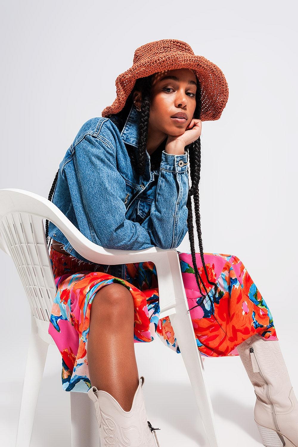 Giacca in denim corta con orlo grezzo in lavaggio medio