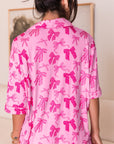 Set pigiama con camicia a maniche corte e pantaloncini con stampa fiocco rosa