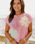 Pull à manches courtes en tricot à fleurs crochetées multicolores rose