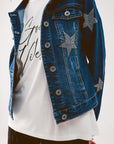 Giacca in denim con decorazione a stella in lavaggio medio