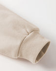 Sweat-shirt en tricot parcheminé avec bordure côtelée et coutures apparentes