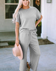 Ensemble t-shirt ample texturé gris et pantalon à cordon de serrage