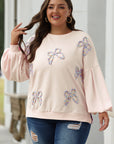 Sweat-shirt oversize à manches lanternes et nœud brodé en parchemin