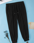 Black Plus Size Textured Exposed Seam Drawstring Jogger Pants - Toi ‘n’ Moi Ltd
