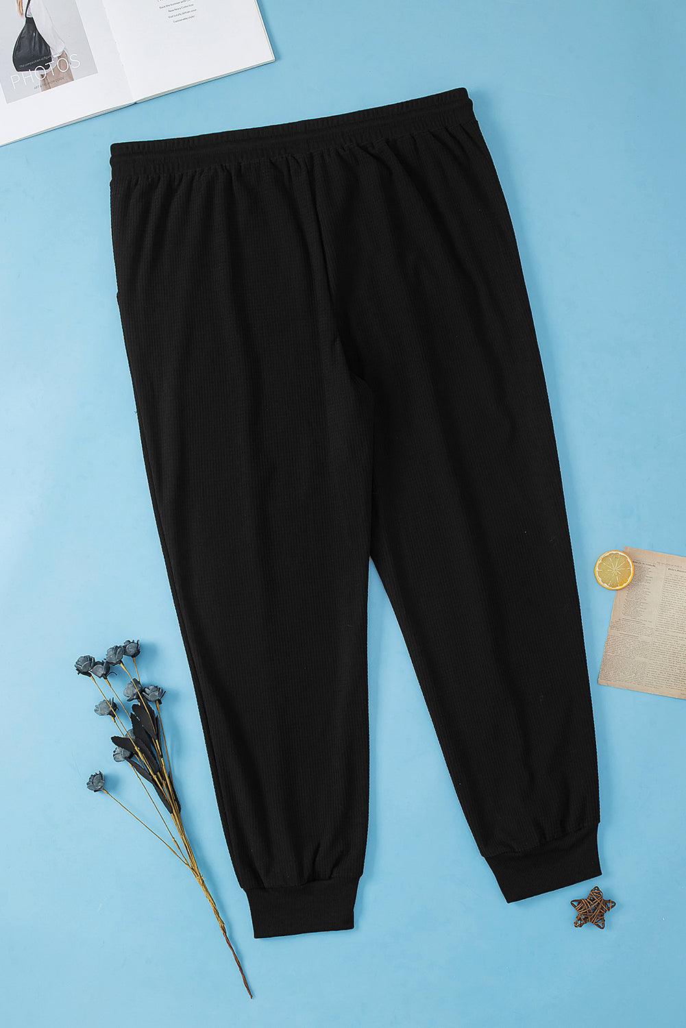 Black Plus Size Textured Exposed Seam Drawstring Jogger Pants - Toi ‘n’ Moi Ltd