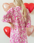 Mini-robe babydoll ample à imprimé léopard rose