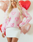 Pull ample à manches bouffantes en forme de cœur rose