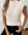 Gilet pull col montant en tricot torsadé à l'avoine