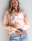 Chemise ample à manches ballon et col à imprimé floral blanc