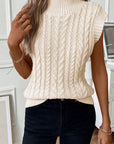 Gilet pull col montant en tricot torsadé à l'avoine