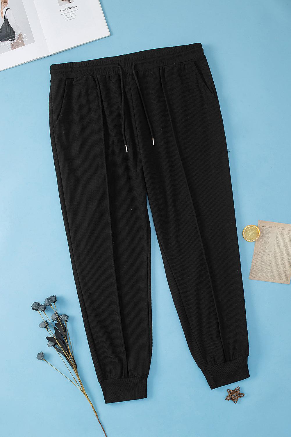 Black Plus Size Textured Exposed Seam Drawstring Jogger Pants - Toi ‘n’ Moi Ltd
